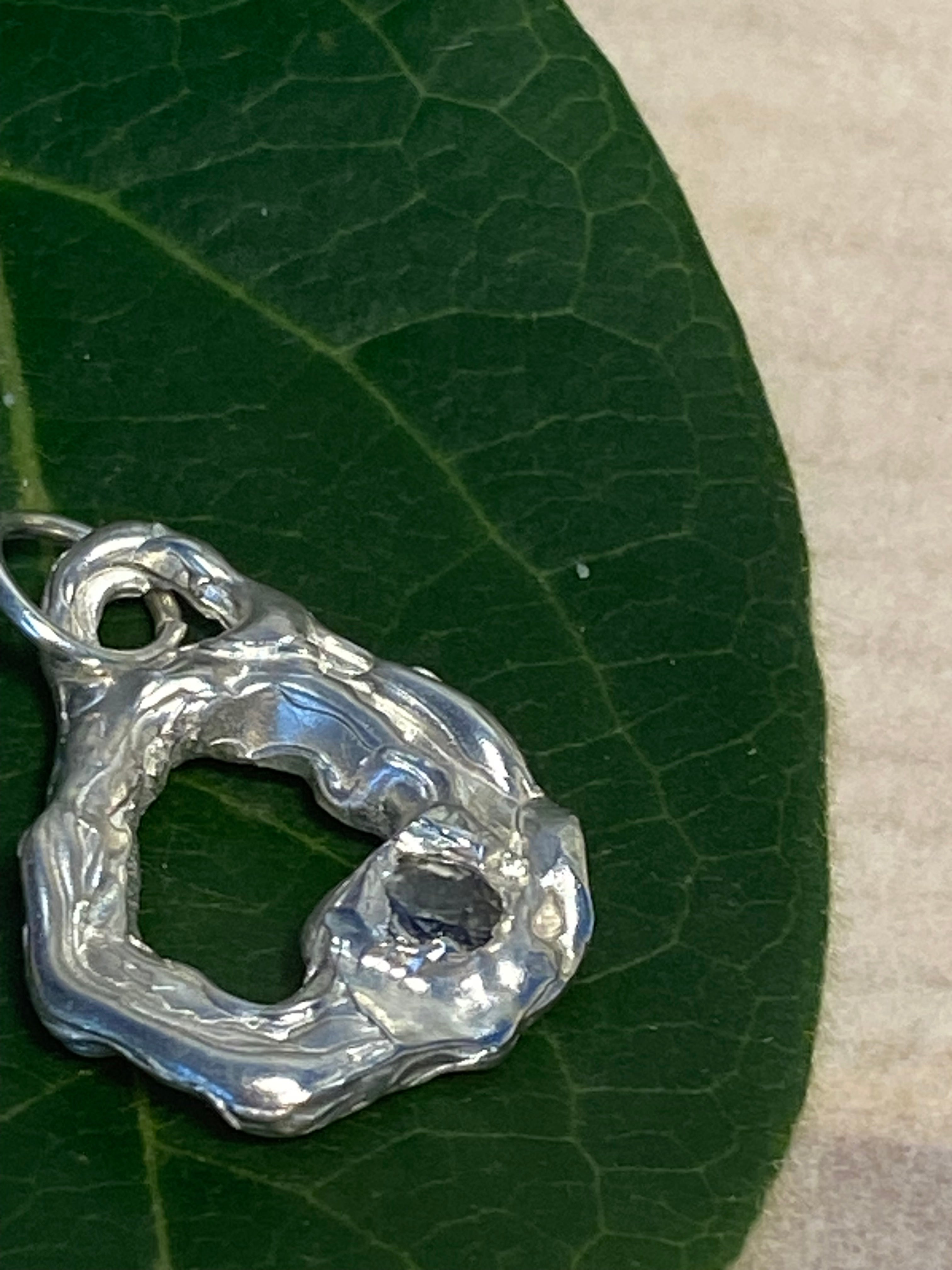 Sterling silver and grey/blue Rhodolite pendant