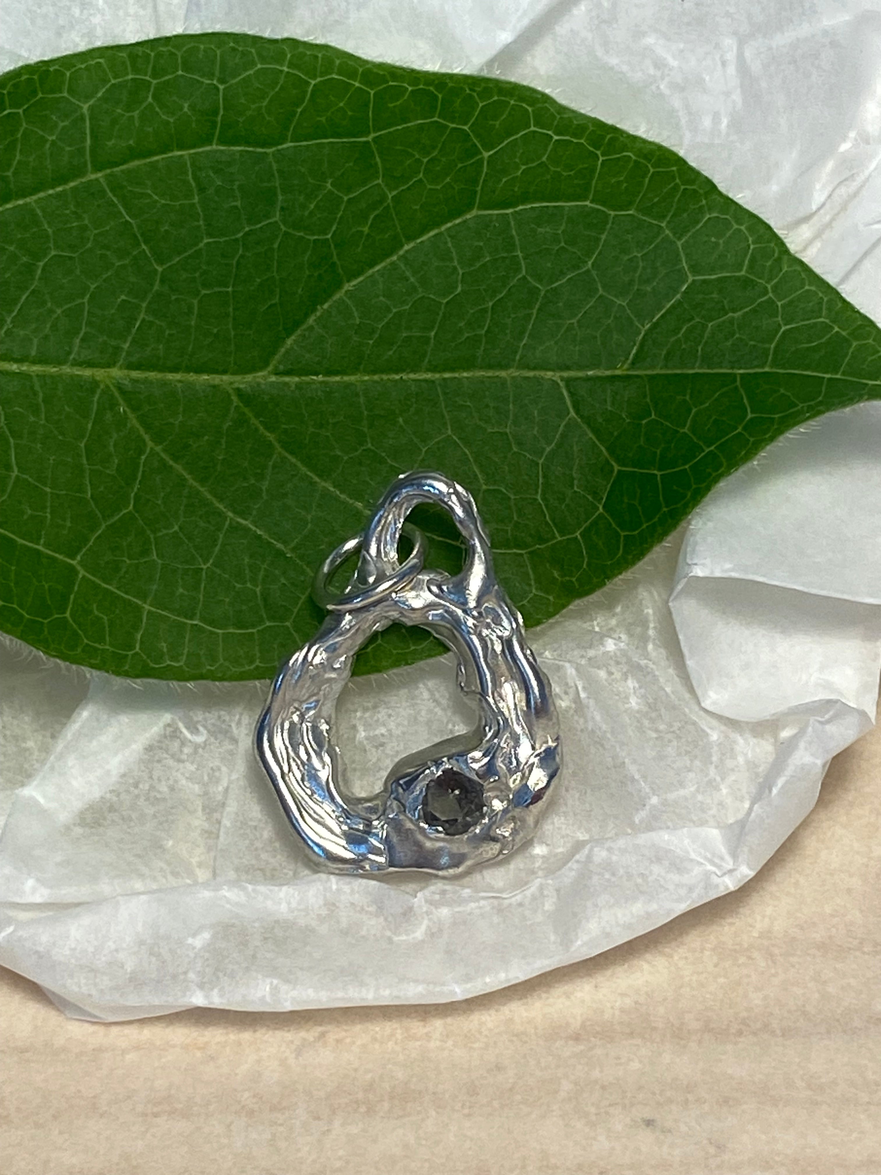 Sterling silver and grey/blue Rhodolite pendant