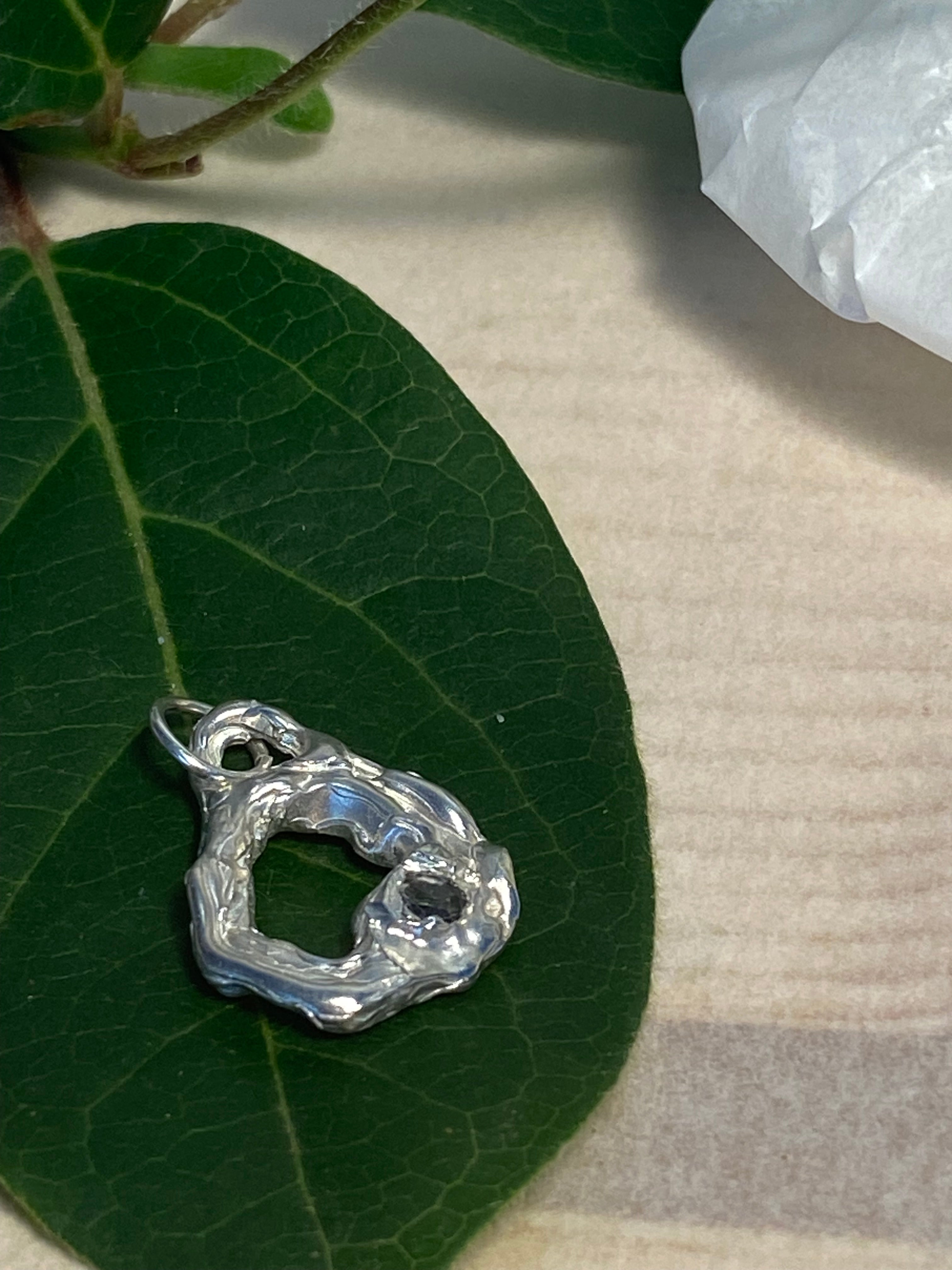Sterling silver and grey/blue Rhodolite pendant