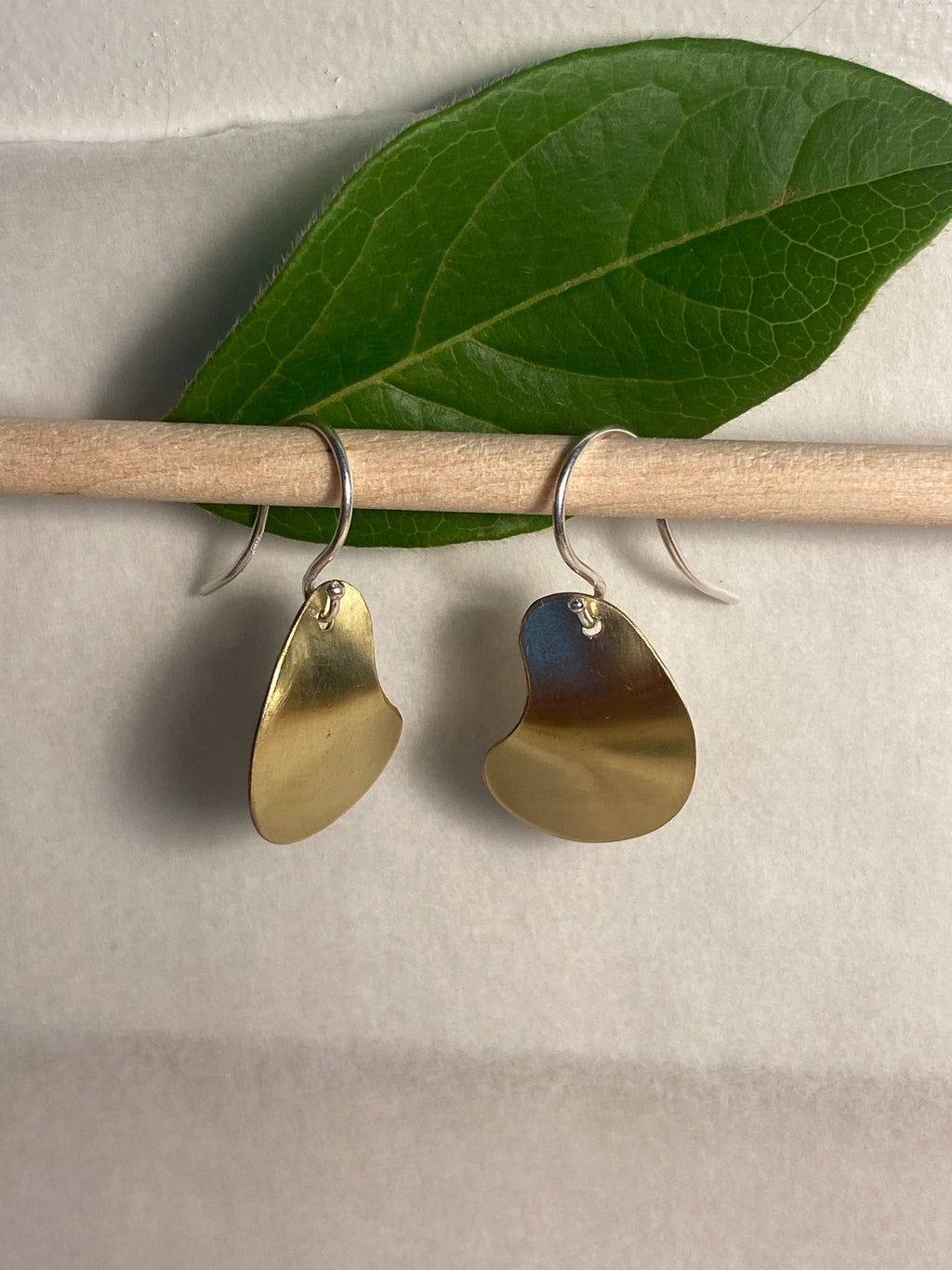 Polished brass earrings with sterling silver loops
