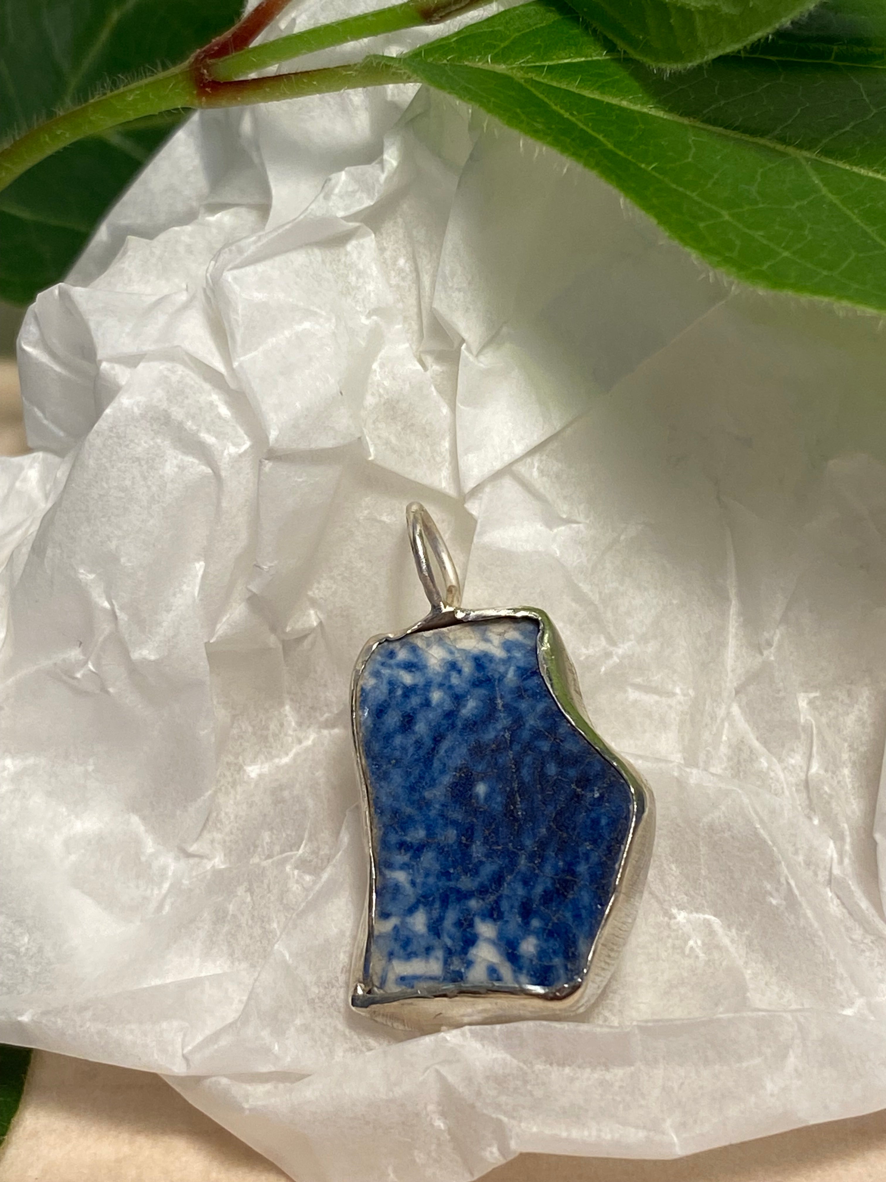 Blue and white sea pottery and sterling silver pendant